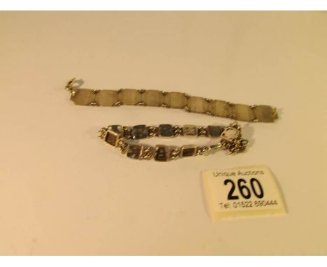 2 vintage silver bracelets with one spelling out 'Margaret' and the other being engine turned