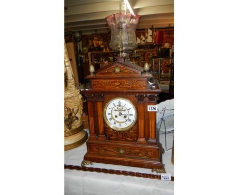 A fine quality rosewood inlaid table clock