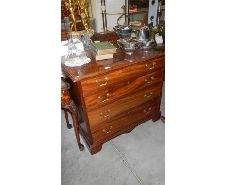 A Georgian 4 drawer chest on bracket feet