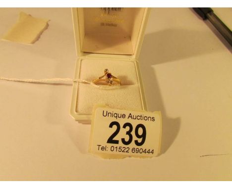 An Edwardian ring set with ruby and diamond in 18ct gold, hallmarked Birmingham 1904, size L