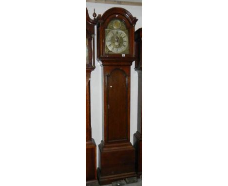 An early 18th Century oak longcase clock with brass dial by Jasper Taylor, London