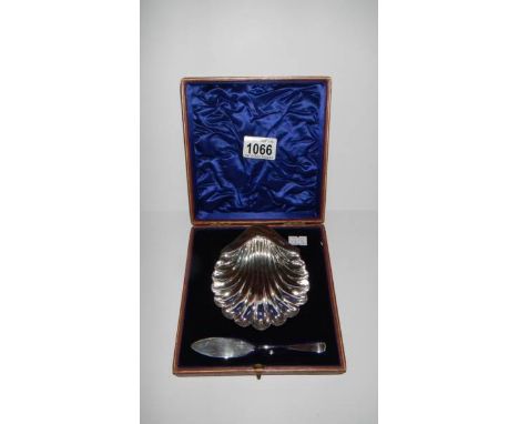 A cased silver sweetmeat dish and fork