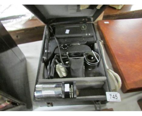 A model AAA Tri-purpose projector in case