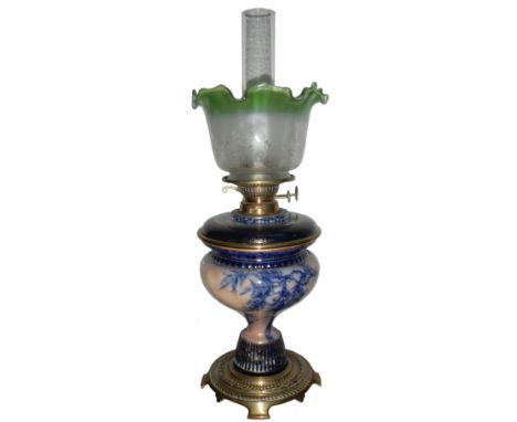 A Victorian Royal Doulton oil lamp with later shade, in good condition
