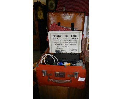 A Johnson Optiscope with slide carriers, spare bulbs etc (Formerly the property of magic lantern expert and lecturer Monty Fi
