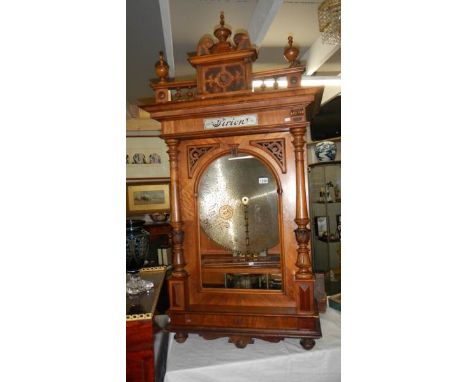 A Victorian Sirion polyphon with 30 discs each playing 2 tunes, in excellent condition and good working orderNo teeth missing