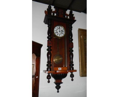 A Victorian mahogany Vienna wall clock, in working order
