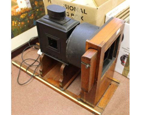 A large mahogany projector