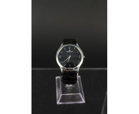 A gents Jaeger-LeCoultre wristwatch, black dial exhibition back, on black leather strap