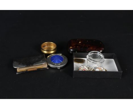 A mixed lot including a tortoiseshell purse with yellow and white metal inlay decoration, silver patch pot with blue enamel d