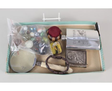 Miscellaneous items to include a magnifying glass, wooden pin cushion, hip flask etc