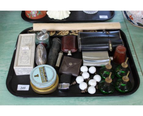 A mixed lot including furniture knobs, flasks and a circular slide rule etc