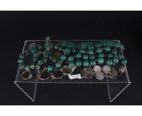 A mixed lot including jade bead necklaces, bracelet, silver coin bracelet, 9ct gold and silver ring etc