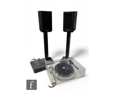 A J A Michell Gyro Dec turntable, housed in a clear perspex case measuring 53cm x 40cm x 15cm, together with a Cyrus two ster
