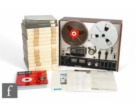 An Akai 4000DB Stereo Tape Deck, Reel-to-Reel, with original operator's manual, together with a collection of BASF Double Pla