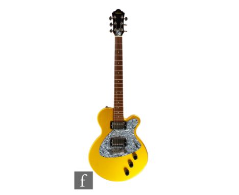 A Yamaha AES500 electric guitar, serial number OJ0303B, gold sparkle finish, sold with&nbsp;Postal Monkey guitar case.