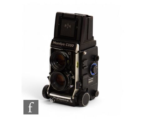 A Mamiya C330 Professional S medium format 80mm blue dot camera, Mamiya -Sekor S f=80mm 1:2.8 lens and marked Seiko 2.8 - 32.