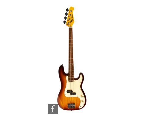 A Jay Turser&nbsp;JTB-400C bass guitar, sold with guitar bag.