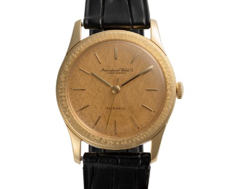 A GENTLEMAN'S SIZE 18K SOLID GOLD IWC AUTOMATIC WRIST WATCH DATED 1970, WITH ORIGINAL FLORENTINE FINISH TO DIAL & BEZEL Movem