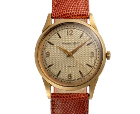 A RARE GENTLEMAN'S SIZE 18K SOLID GOLD IWC AUTOMATIC WRIST WATCH CIRCA 1950s, WITH GUILLOCHE DIAL Movement: Automatic, signed