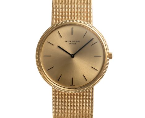 A GENTLEMAN'S SIZE 18K SOLID GOLD PATEK PHILIPPE CALATRAVA BRACELET WATCH DATED 1970, REF. 3520 ACCOMPANIED BY A PATEK PHILIP