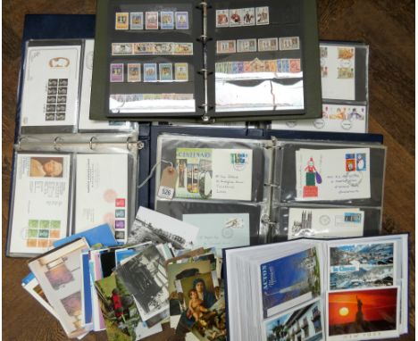 Large accumulation of first day covers contained within 3 albums, together with an album of mint stamps and a large accumulat