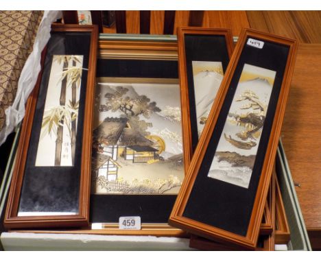 A collection of Japanese engraved metal plaque wall art comprising four rectangular panels and a larger square glazed panel s