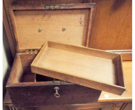 A locking oak trinket box with interior shelf 