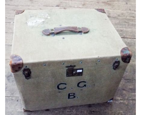 An old canvas square trunk