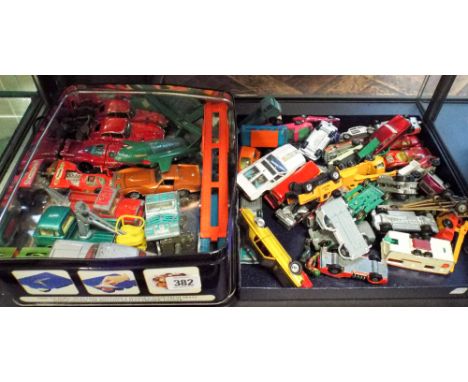 A collection of Corgi and Dinky toys in played with condition