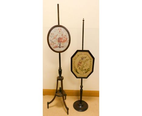 Two Victorian needlework panel mahogany pole screens 