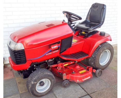 Toro wheel horse ride-on motor lawn mower, with 20 HP Kohler engine, fitted 48" motion cutting deck