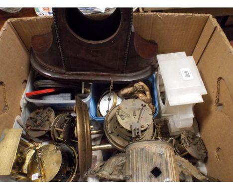 A collection of clocks, clock cases and clock mechanisms 