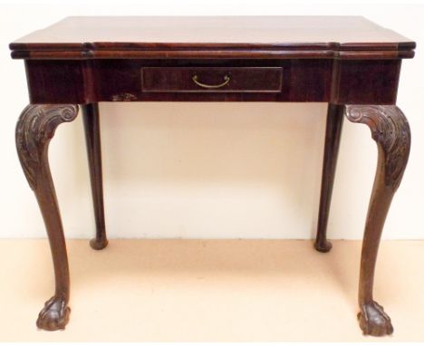 A shaped front Georgian style mahogany folding top card table on cabriole legs with claw and ball feet 2'9" wide 