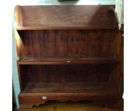 A varnished pine, three shelf, bookcase 