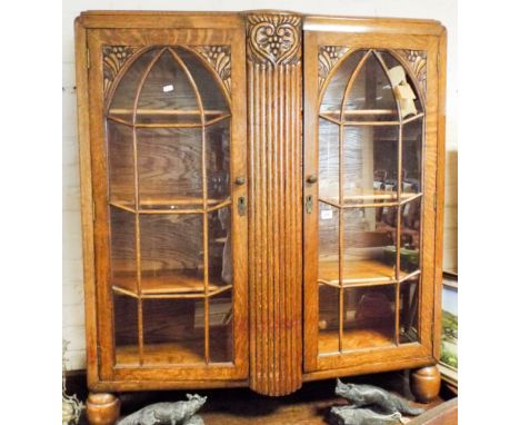 1930s Oak bookcase with astragal glazed doors   One glazing panel damaged 