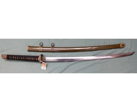 Japanese World War II sword complete with its scabbard and binding to the handle. Overall length of the blade 70cm.