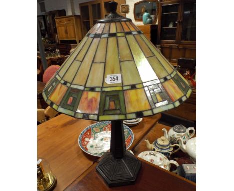 A large Tiffany style table lamp and shade