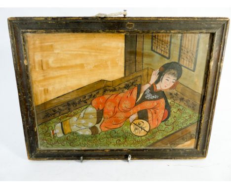 Oriental painting on a soapstone panel, depicting a reclining lady. Character marks on reverse and a simple wooden frame, 20 
