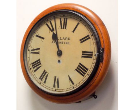 A Victorian oak framed school clock with an 111/2" dial with Roman numerals stamped Collard Axminster 