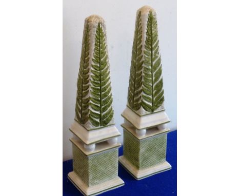 A pair of decorative Italian ceramic Obelisks decorated with ferns, printed makers mark Este to underside and each signed in 
