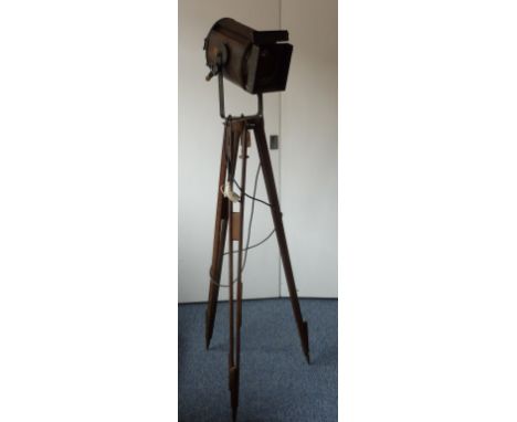 An early 20th century French Theatre/Cinema Light on adjustable tripod base
