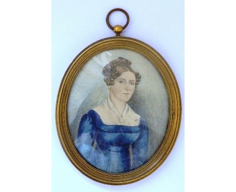 A 19th century gilt-metal framed and glazed watercolour, half-length oval female portrait study, the  9cm high including fram