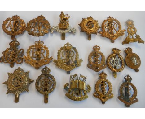 Nineteen Support Arms cap badges: the Royal Pioneer Corps; the Auxiliary Territorial Service; the Queen Mary's Auxiliary Army