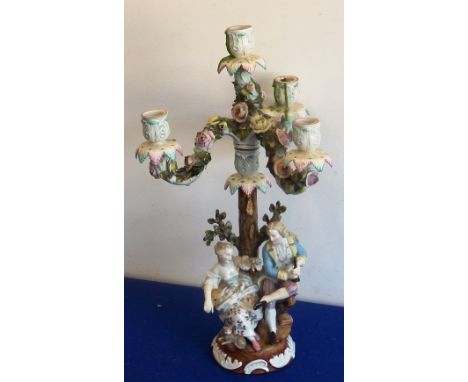 A late-19th/early-20th century Dresden-style four-light porcelain Candelabra, the detachable upper section encrusted with flo