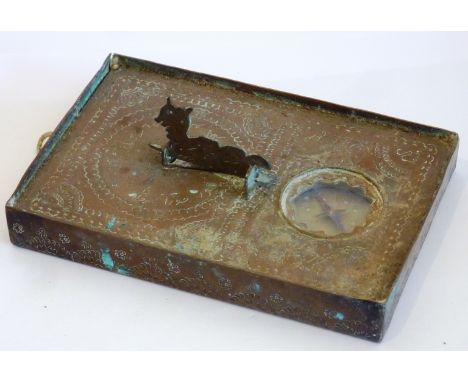 A heavy copper travelling Compass/Sundial, the gnomon modelled as a mythical beast, the reverse with calligraphy, 16cm 