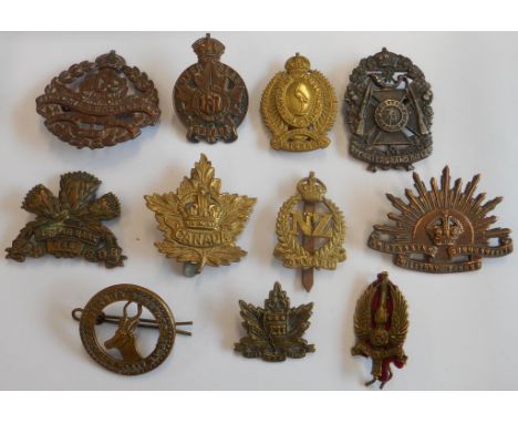 Eleven foreign and Commonwealth cap badges: Canada Overseas 211;   Canada Overseas 109 Victoria & Haliburton - Duty; Canada O