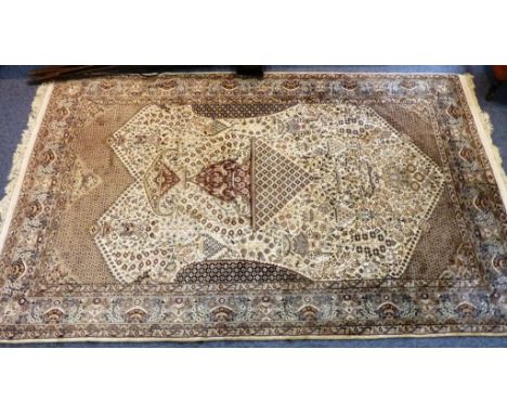 A very fine hand-knotted Persian silk mixture Prayer Carpet, the central 'arrow' against a predominantly cream ground and dec