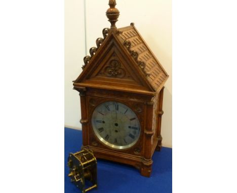 An early 20th century oak-cased eight-day Bracket Clock, in reformed Gothic style, the silvered dial signed 'W. Benson, Old B