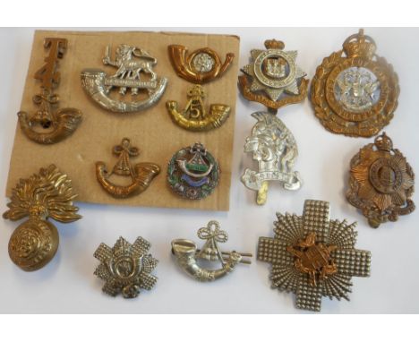 Six London regimental cap badges (some rare) and a group of eight Light Infantry badges: the City of London Yeomanry Rough Ri